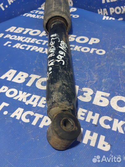 Задний амортизатор Fiat Albea седан 2011