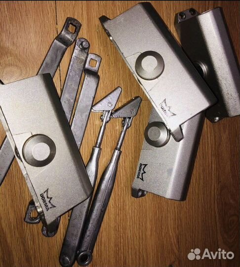 Дверные доводчики Dorma