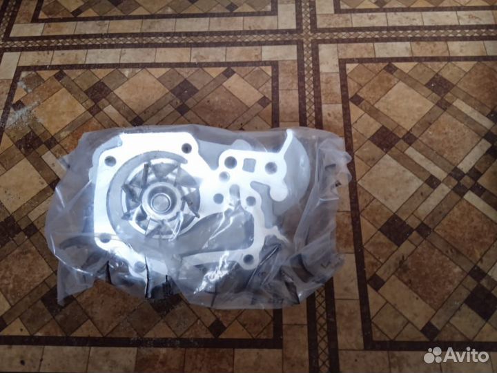 Помпа Free-Z Renault Logan