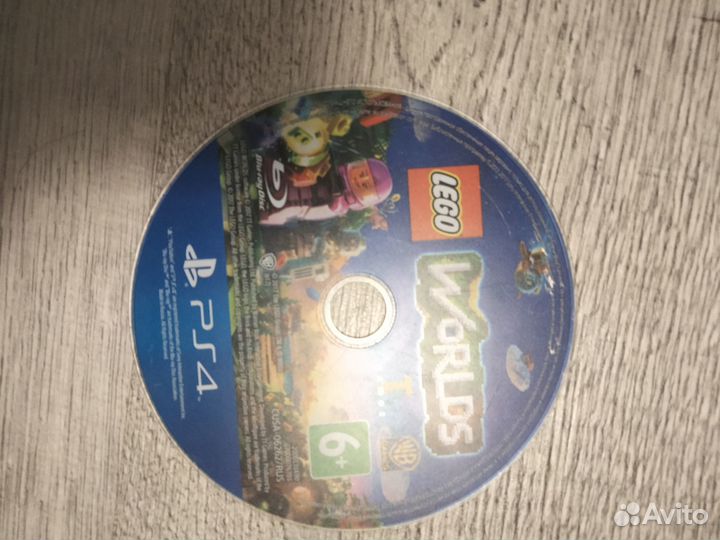 Диски на ps4 lego Worlds без коробки