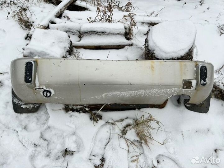 Бампер задний Daihatsu Storia EJ 2000