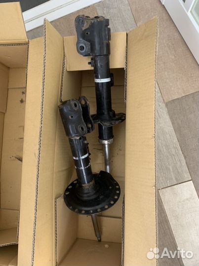 Стойка амортизатора outlander