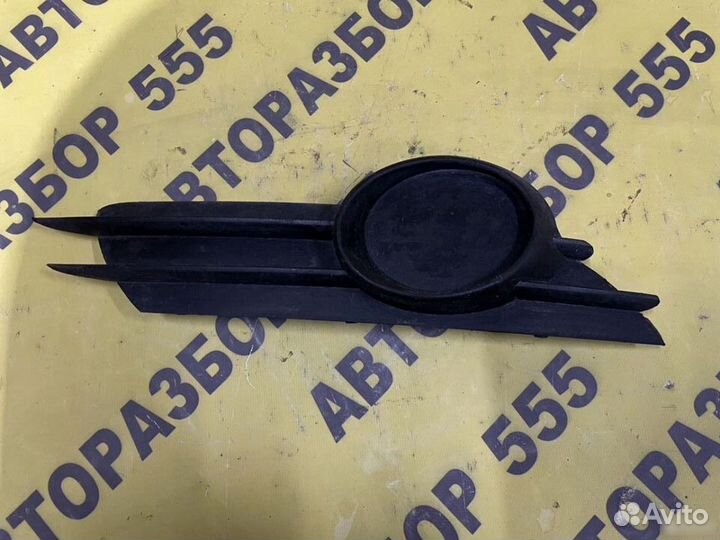 Заглушка противотуманной фары правой Opel Corsa D