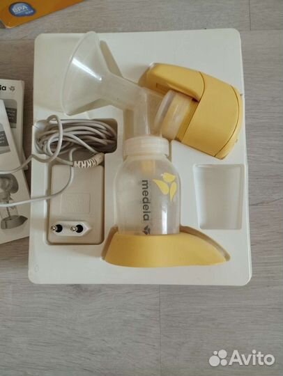 Молокоотсос medela электрический