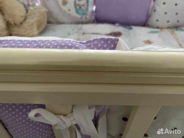 Детская кроватка с маятником