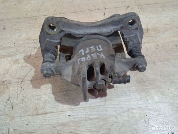 Суппорт передний левый Mitsubishi Carisma DA 1.6