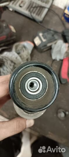 Натяжитель приводного ремня с роликами