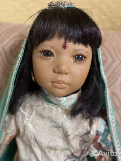Виниловая кукла