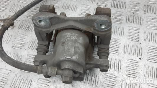 Суппорт тормозной задний левый toyota camry V50 (7