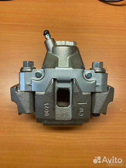 Суппорт тормозной левый Toyota