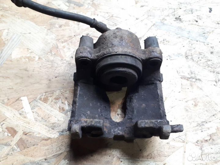 Суппорт передний левый Opel Astra G 1998-2005