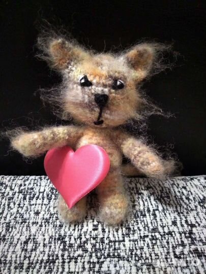 Котенок игрушка