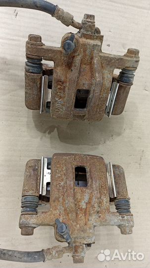 Суппорт тормозной правый левый Шевроле Лачетти