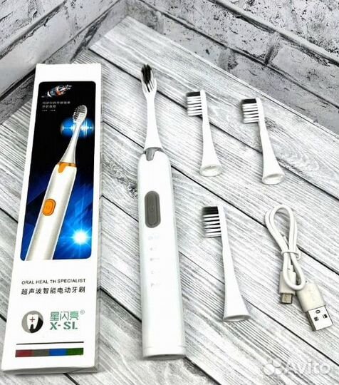 Электрическая зубная щётка 4 насадки в комплекте