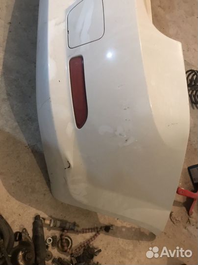 Задний бампер рено логан2011год