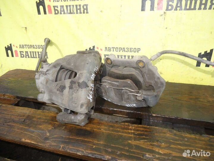 Суппорт передний левый Volkswagen Jetta