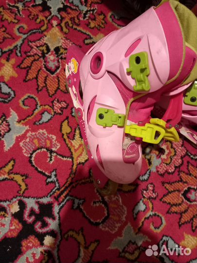 Роликовые коньки