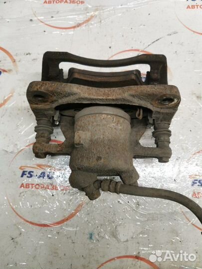 Суппорт тормозной передний левый Suzuki Sx4 1.6