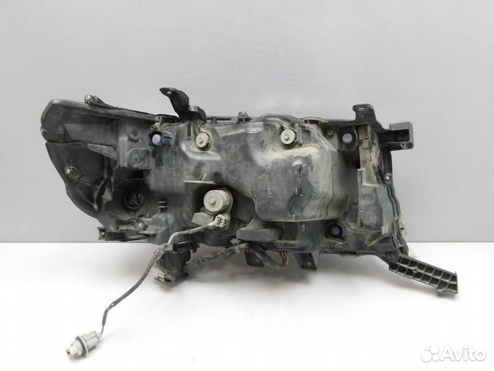 Фара левая Toyota Land Cruiser