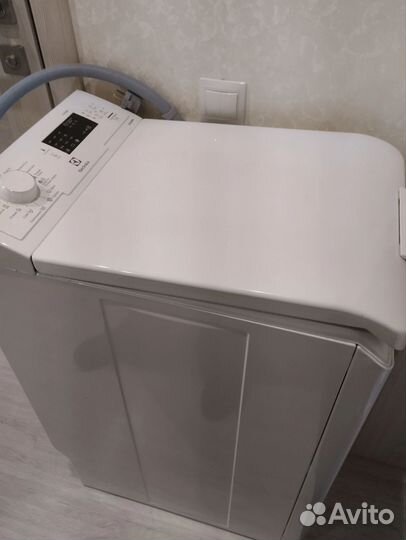 Стиральная машина с вертикальной загрузкой