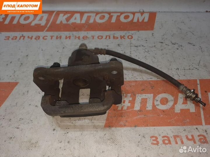 Суппорт тормозной задний левый Nissan X-Trail T31