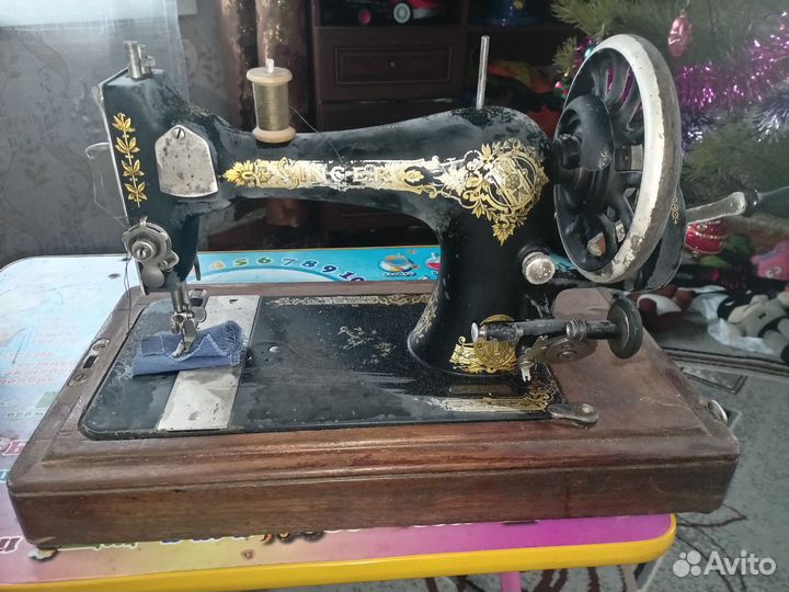 Швейная машина Зингер