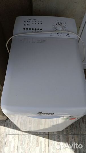 Стиральная машина с вертикальной загрузкой