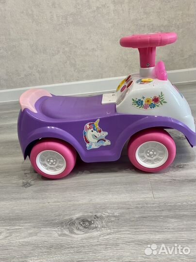 Машинка-каталка музыкальная