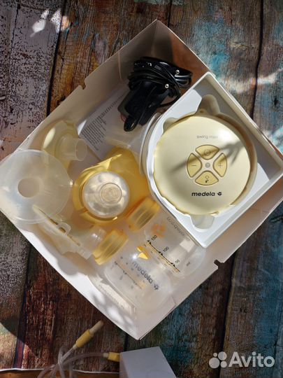 Молокоотсос двойной medela swing maxi