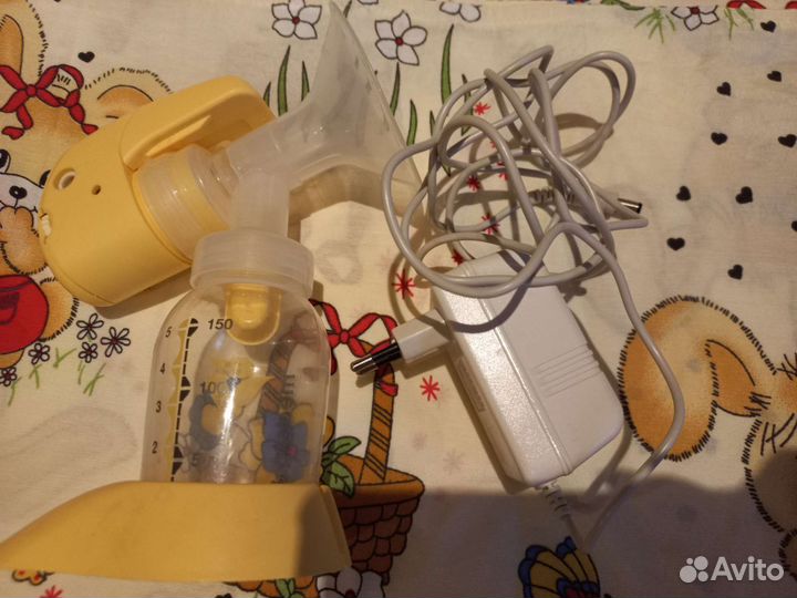 Молокоотсос medela электрический