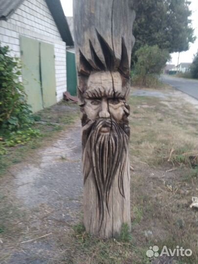 Продам вырезанное дерево в форме лица