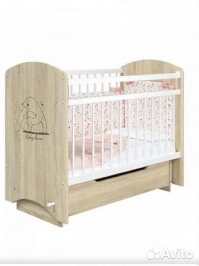 Детская кроватка с маятником