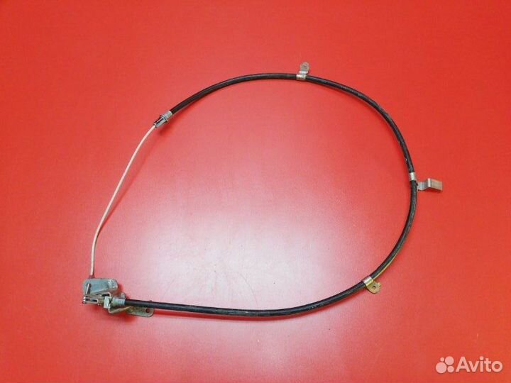 Трос стояночного тормоза передний Nissan Teana J32