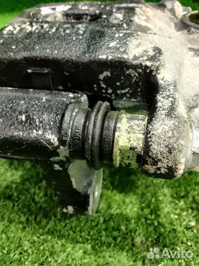 Суппорт тормозной задний левый Hyundai Elantra XD