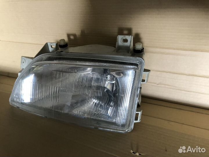Фара левая Ford Escord оригинал