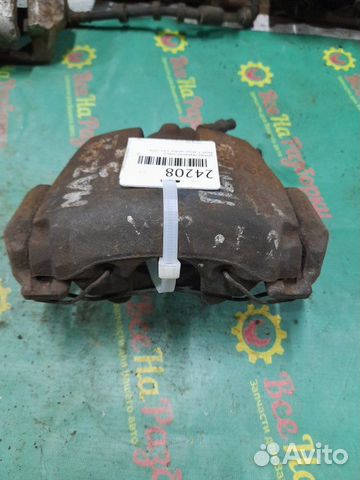 Суппорт передний левый Mazda 3-Series хечбэк 1.6Л