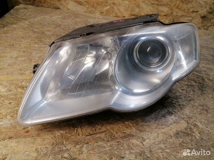 Фара галоген левая Volkswagen Passat B6