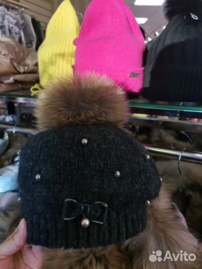 Помпоны енот