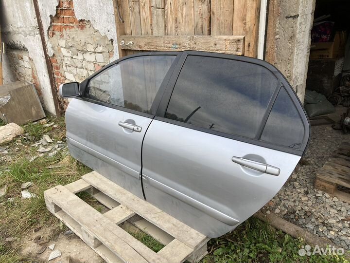 Двери левые mitsubishi lancer 9