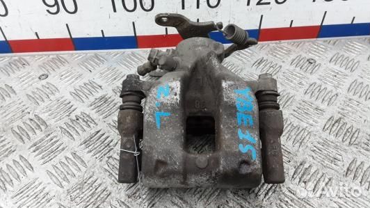 Суппорт тормозной задний левый toyota avensis T27