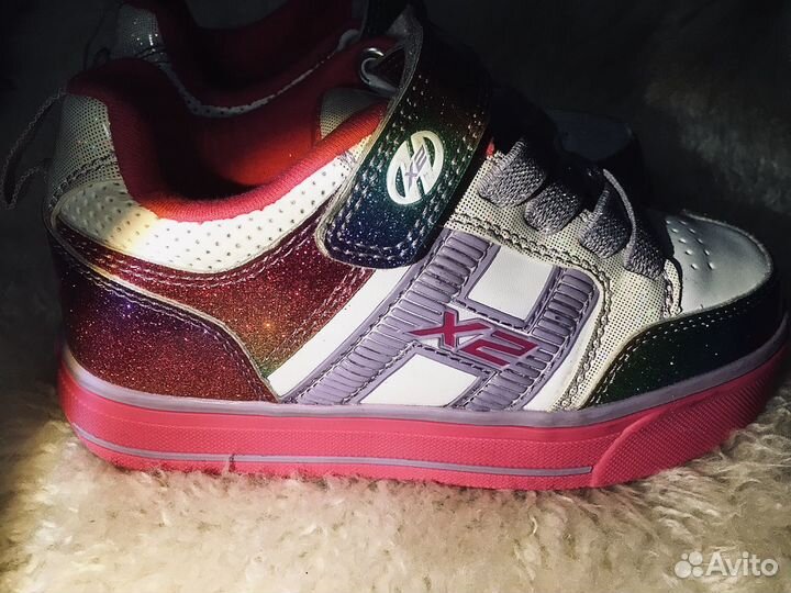 Роликовые кроссовки Heelys