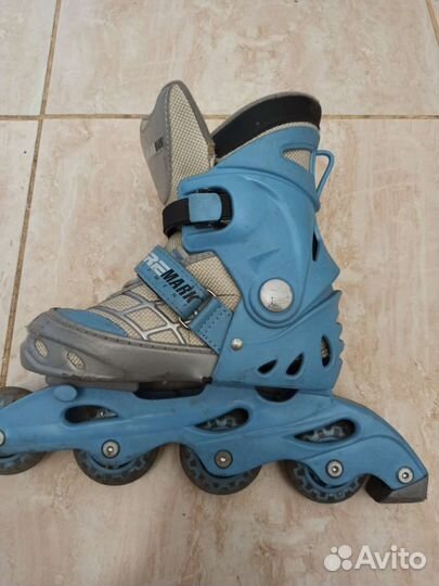 Роликовые коньки