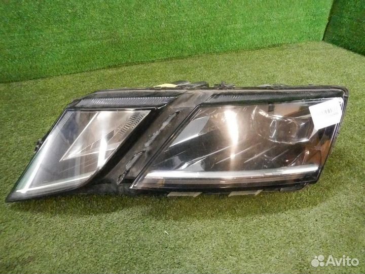 Фара левая Skoda Octavia