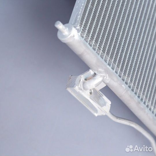 Радиатор кондиционера Ниссан Альмера В10 06-12