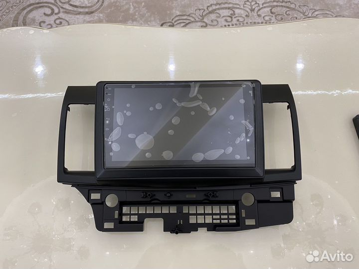 2din андроид магнитола на митсубиси лансер