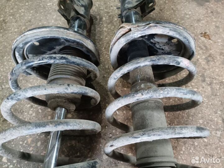 Стойка подвески передняя Mitsubishi Lancer 9