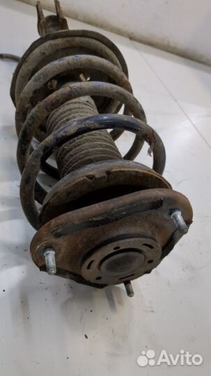 Амортизатор подвески левый передний Toyota Corolla E12