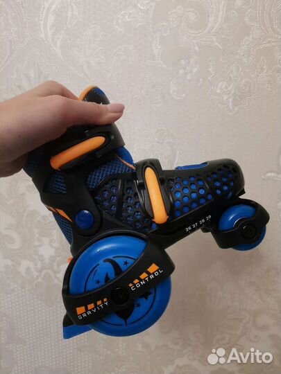 Роликовые коньки