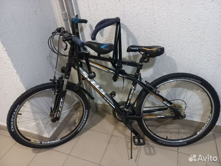 Продам велосипед с детским сиденьем