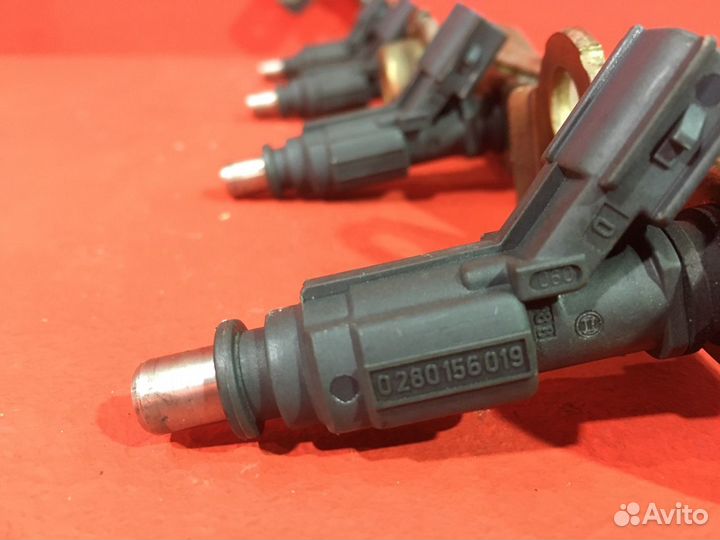 Форсунка топливная Toyota Corolla E12 хетчбэк